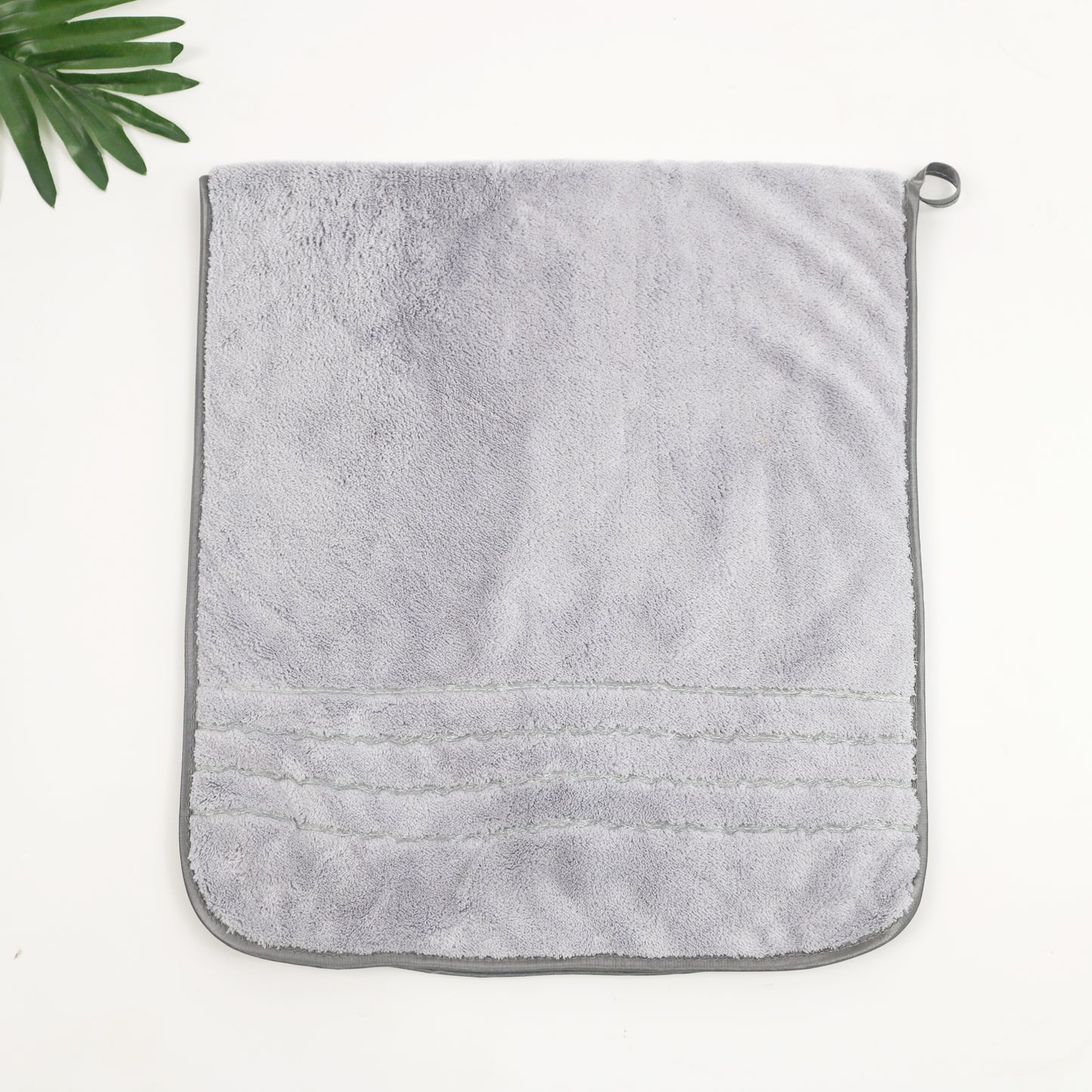 Cotton-like coral velvet towel - with satin edges