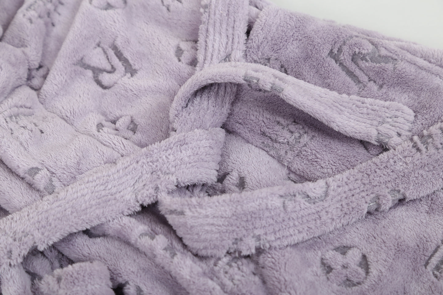 Hollowed-out pattern bath robe